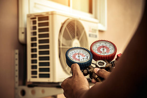 Professional Ac Installation technician working in State Center, IA